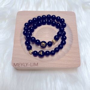 Zodiac sign with black obsidian bracelet